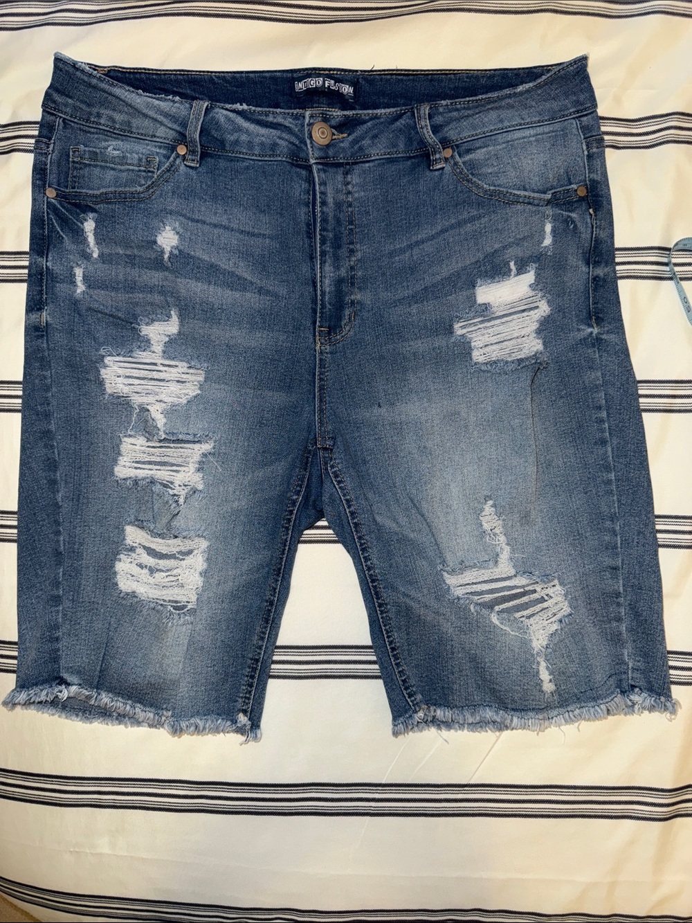 Mid Wash Distressed Bermuda Shorts by Indigo Fusion.